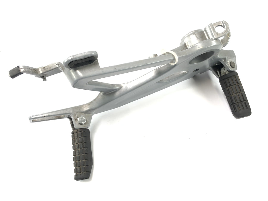 Honda SLR 650 RD09 [1997] - FootRest System på høyre fotstøttebrakett
