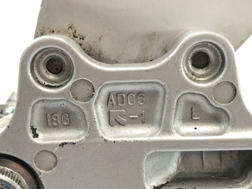 Suzuki GSX R 1000 WVBZ K3 [2003] - Fotstøttesystem førerens venstre fotstøtteholder med girspak - 0