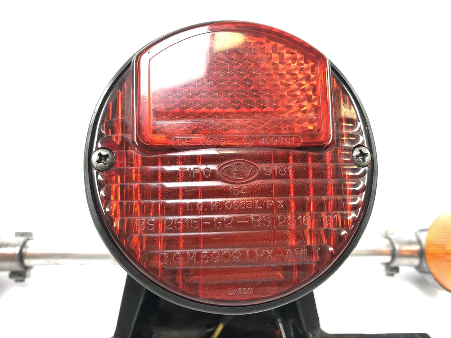 Moto Guzzi V7 Special [1971] - Baklys med indikatorer og lisensplateopptak